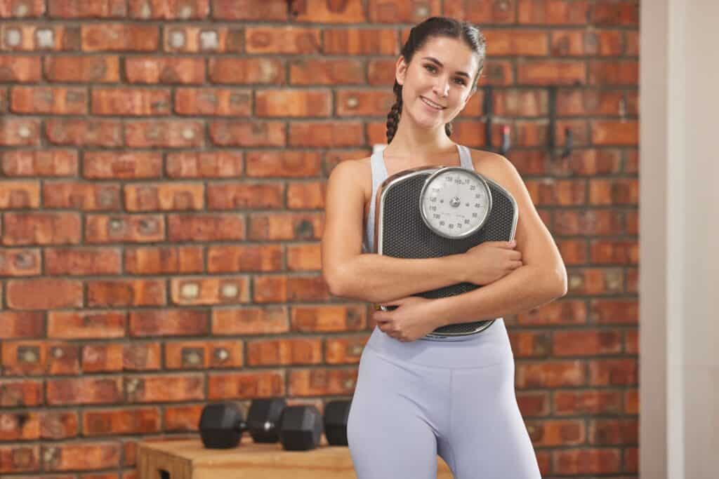 Woman happy to lose excess weight